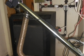 Rotary pellet burner BurnPell EVO Mini (26 kW) installed in solid fuel boiler SIRIJUS